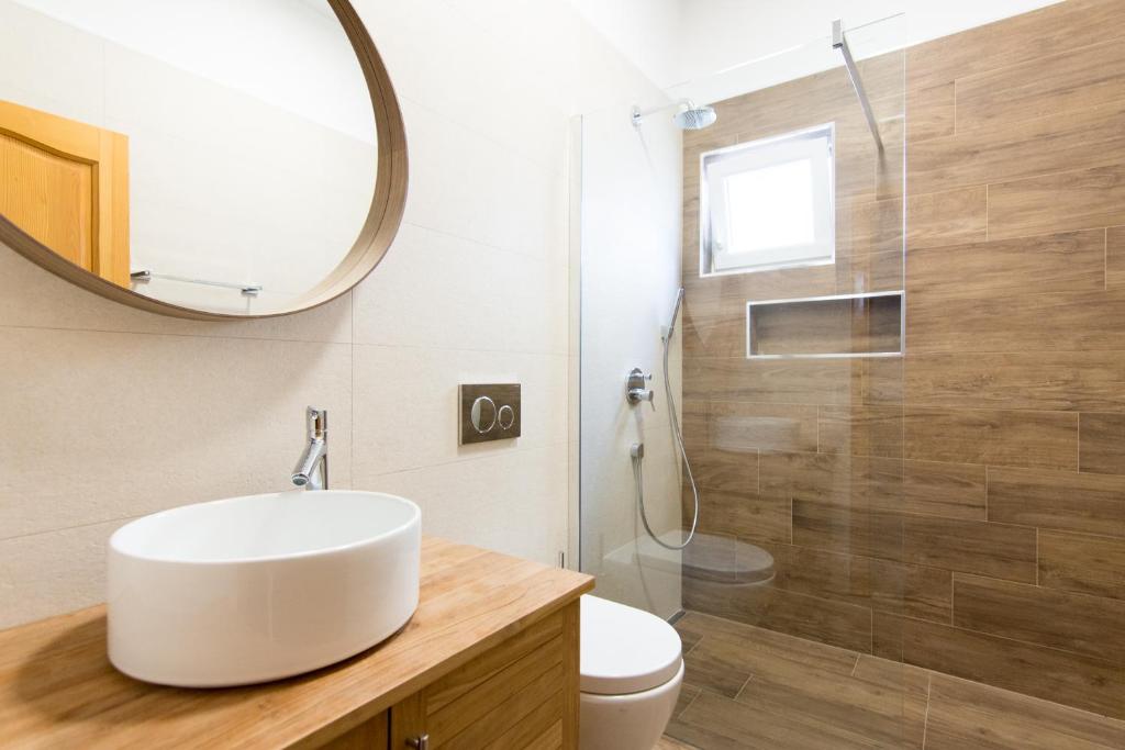 Kúpeľňa v ubytovaní Apartments Basilea