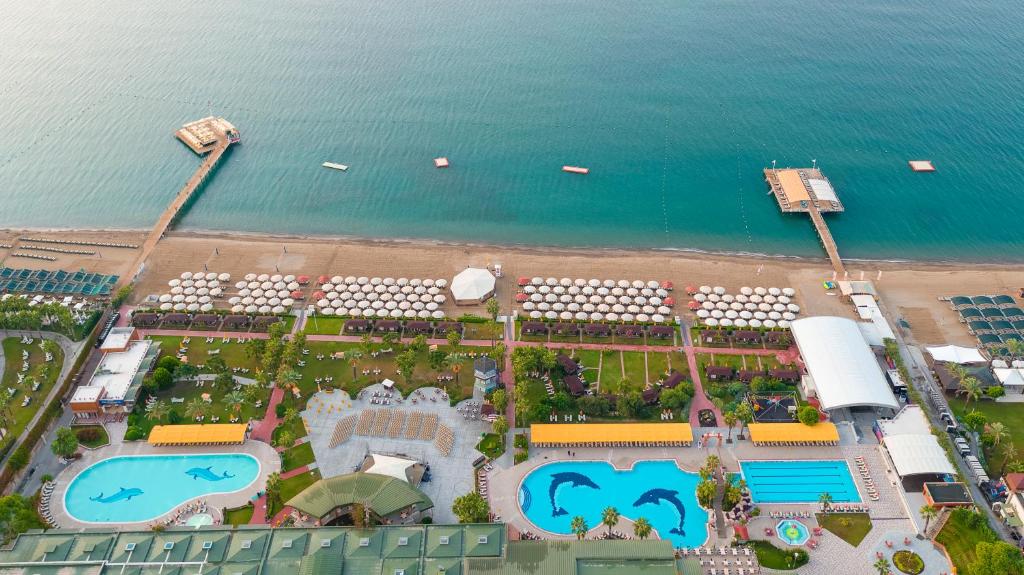 an aerial view of a resort next to the beach at Pine Beach Belek in Belek