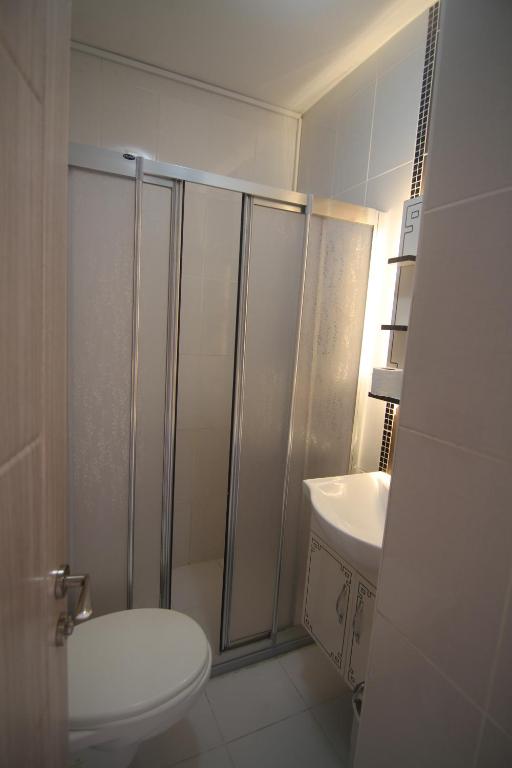 Koupelna v ubytování Grand Liza Hotel