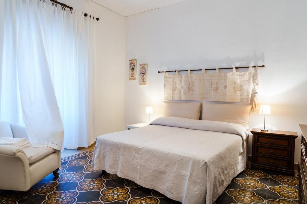 Postel nebo postele na pokoji v ubytování Holiday Home Alle Pavoncelle, indipendente con terrazzo di 60 mq
