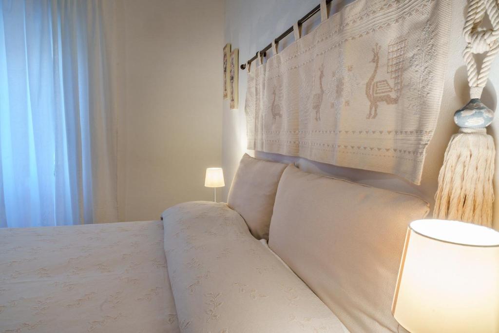 Postel nebo postele na pokoji v ubytování Holiday Home Alle Pavoncelle, indipendente con terrazzo di 60 mq