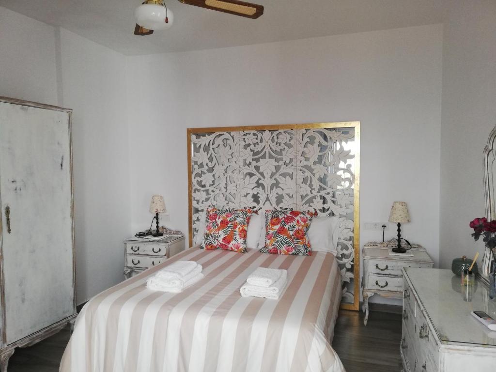 Posteľ alebo postele v izbe v ubytovaní Casa Rural La Luna