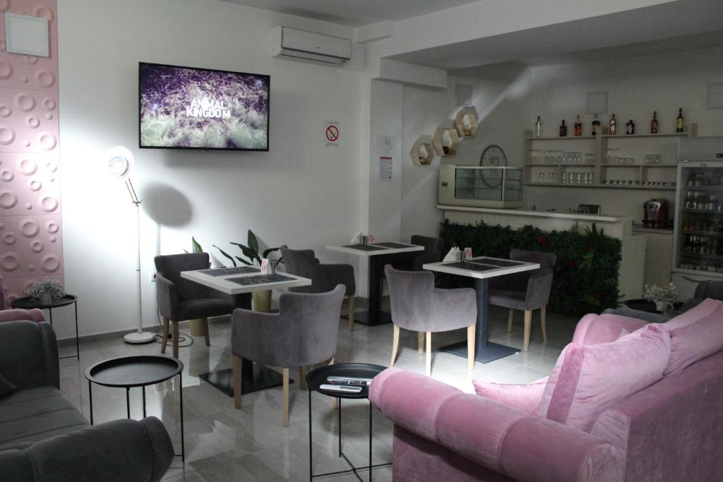 Posezení v ubytování Garni Hotel 11tica DM