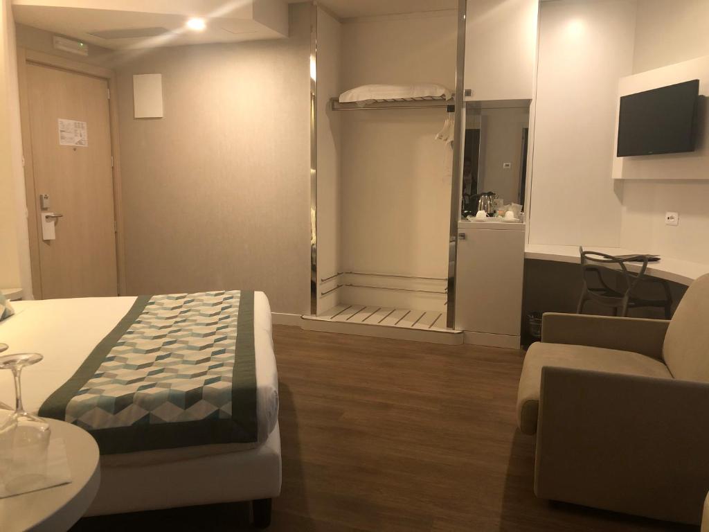 TV a/nebo společenská místnost v ubytování Ark Hotel
