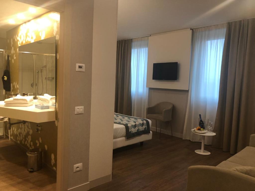 Postel nebo postele na pokoji v ubytování Ark Hotel