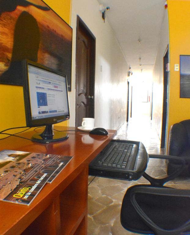 TV a/nebo společenská místnost v ubytování Hotel de Alborada