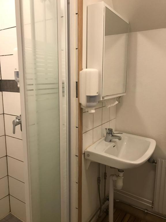 Koupelna v ubytování Halmstad Hotell & Vandrarhem Kaptenshamn