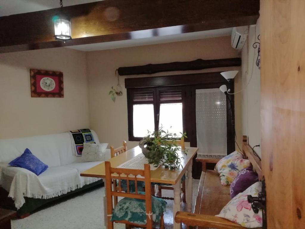 Postel nebo postele na pokoji v ubytování Casa Rural Abuela Maxi