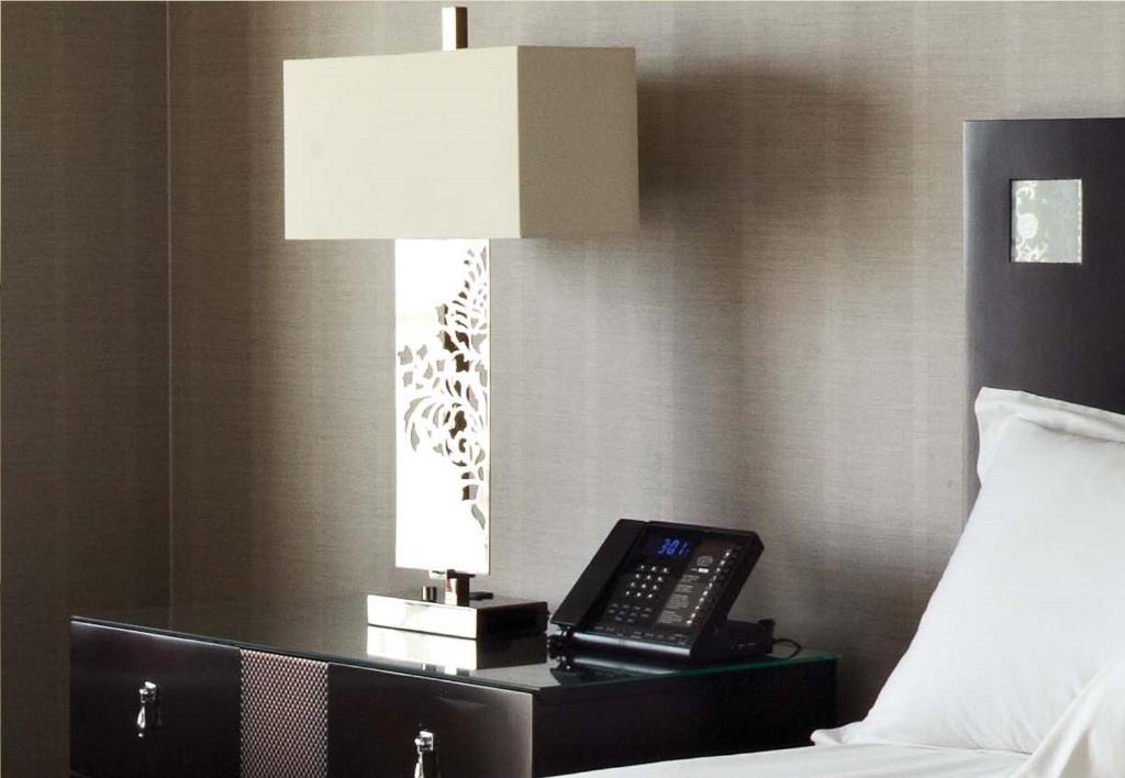 Postel nebo postele na pokoji v ubytování Borgata Hotel Casino & Spa