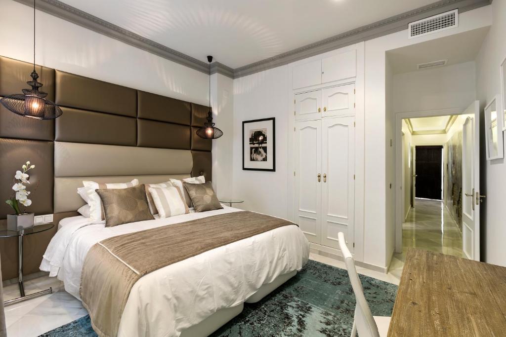 A bed or beds in a room at El Marques - Calle Cister - Centro Historico