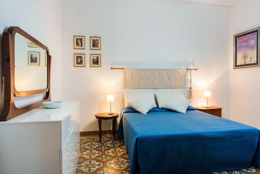 Postel nebo postele na pokoji v ubytování Holiday Home Alle Pavoncelle, indipendente con terrazzo di 60 mq