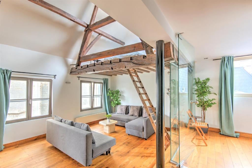 a living room with a loft bed at Tempel Cathedral Lodge in the Heart of Antwerp in Antwerp