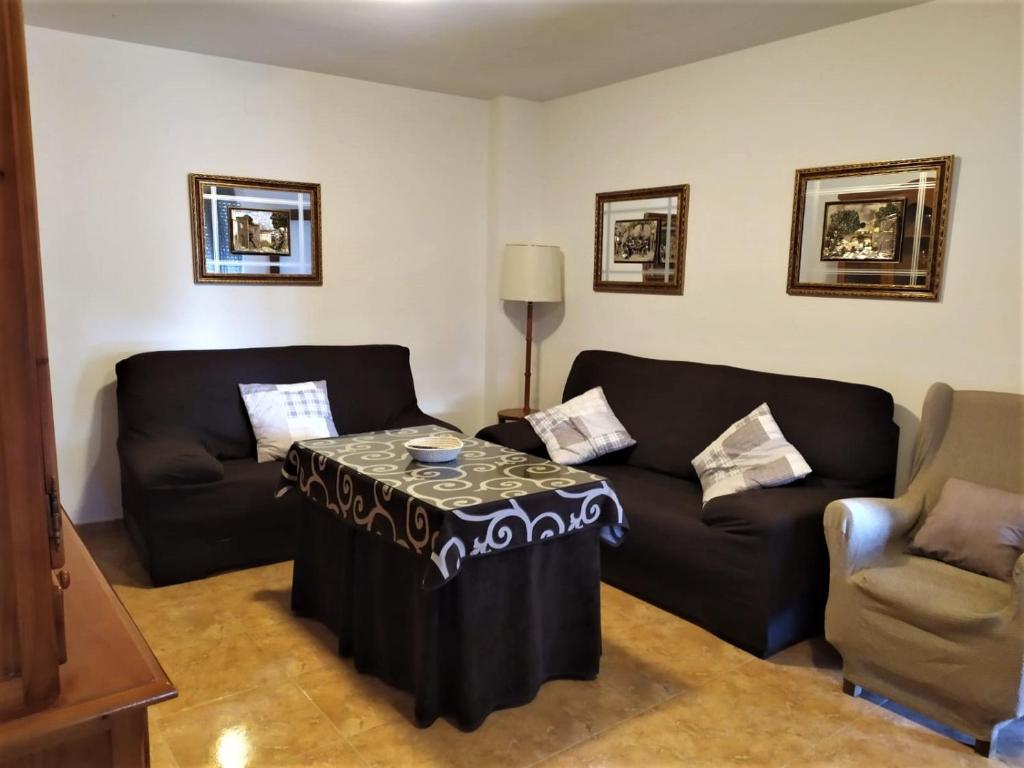 Posedenie v ubytovaní Apartamento Villa Soterraña