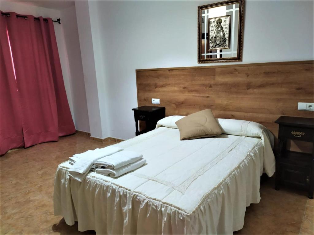 Posteľ alebo postele v izbe v ubytovaní Apartamento Villa Soterraña