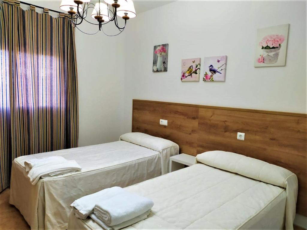Posteľ alebo postele v izbe v ubytovaní Apartamento Villa Soterraña
