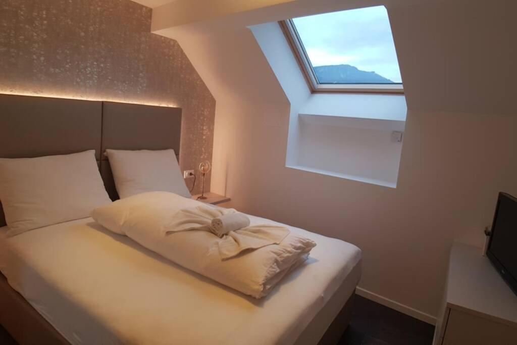 Postel nebo postele na pokoji v ubytování Gardenpark Loft