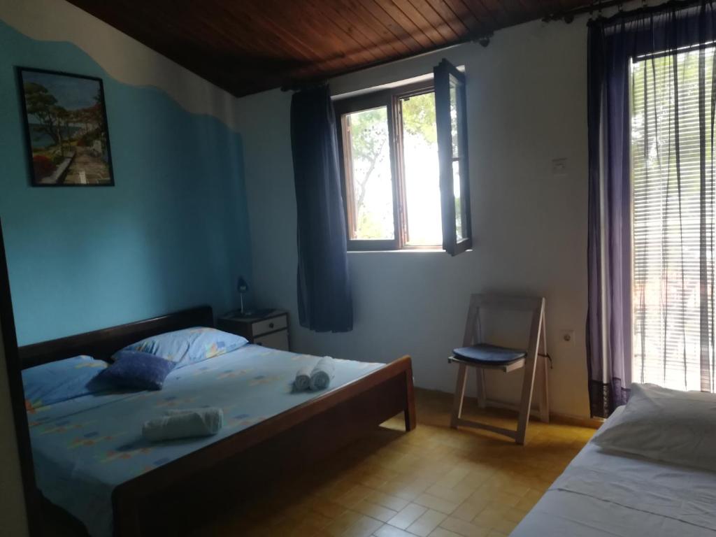 Posteľ alebo postele v izbe v ubytovaní Apartment Veroni