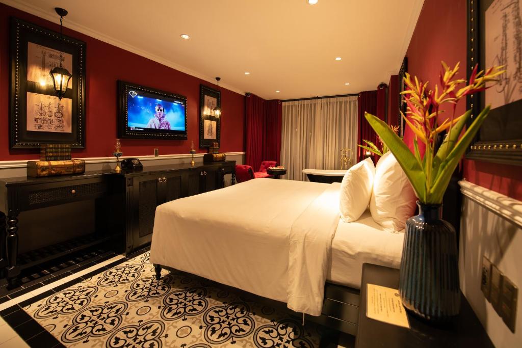 TV a/nebo společenská místnost v ubytování Adora Art Hotel