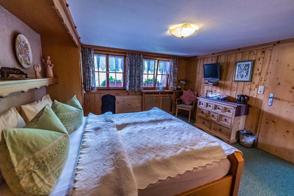 Postel nebo postele na pokoji v ubytování Haus Erika