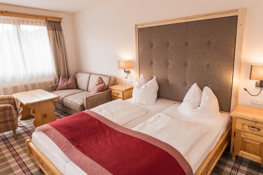 Postel nebo postele na pokoji v ubytování Hotel Sperlhof