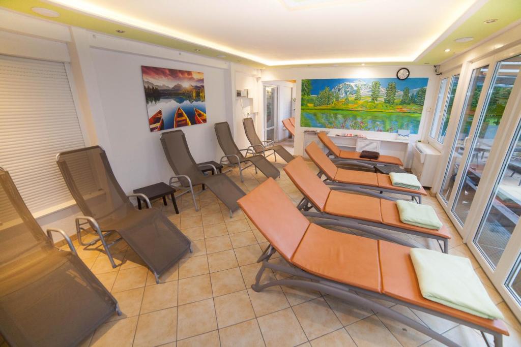 Posezení v ubytování Hotel am Gutspark Prager GbR