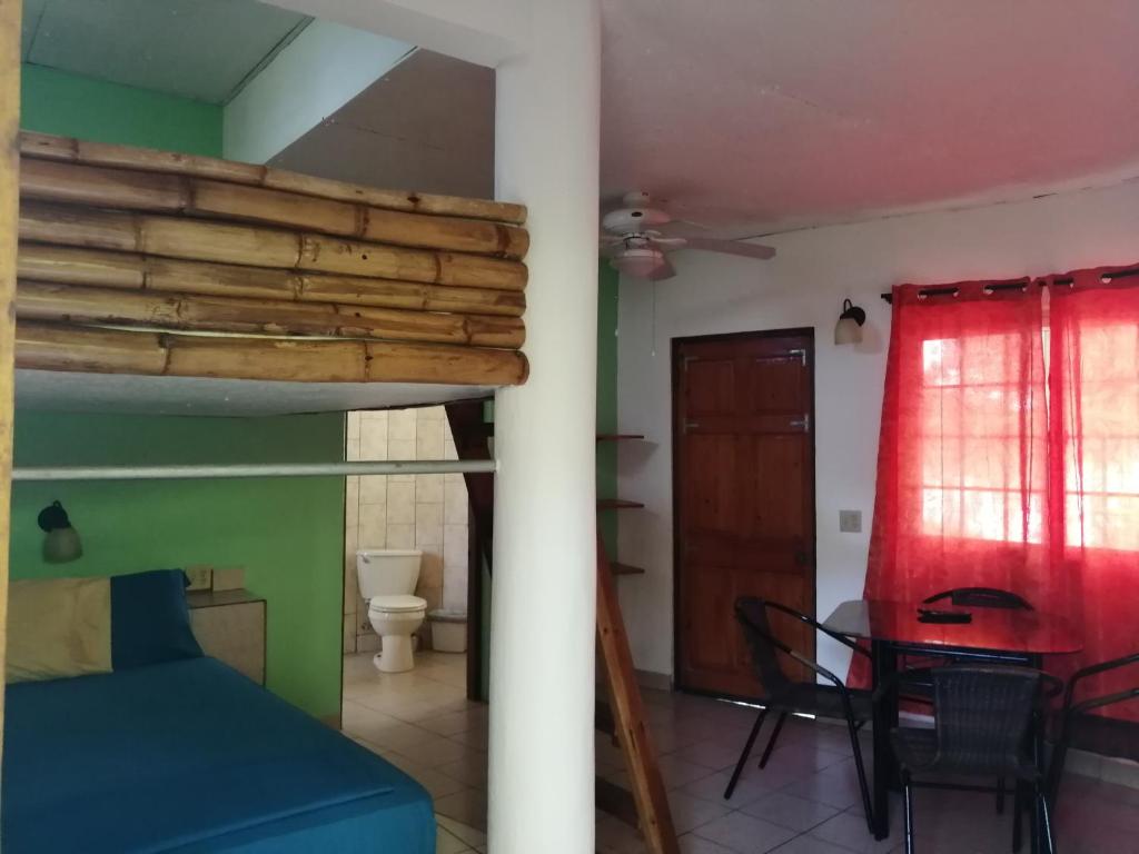 Postel nebo postele na pokoji v ubytování Boca Brava Lodge