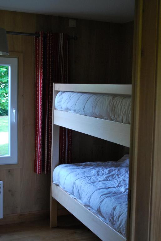 Postel nebo postele na pokoji v ubytování Le Chalet à Bonnerue