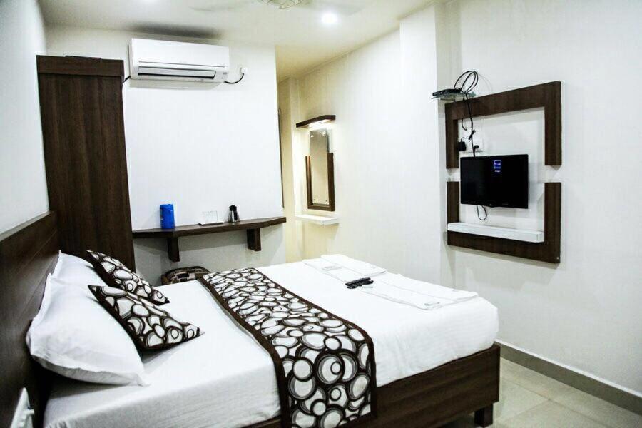 Postel nebo postele na pokoji v ubytování Hotel Delma