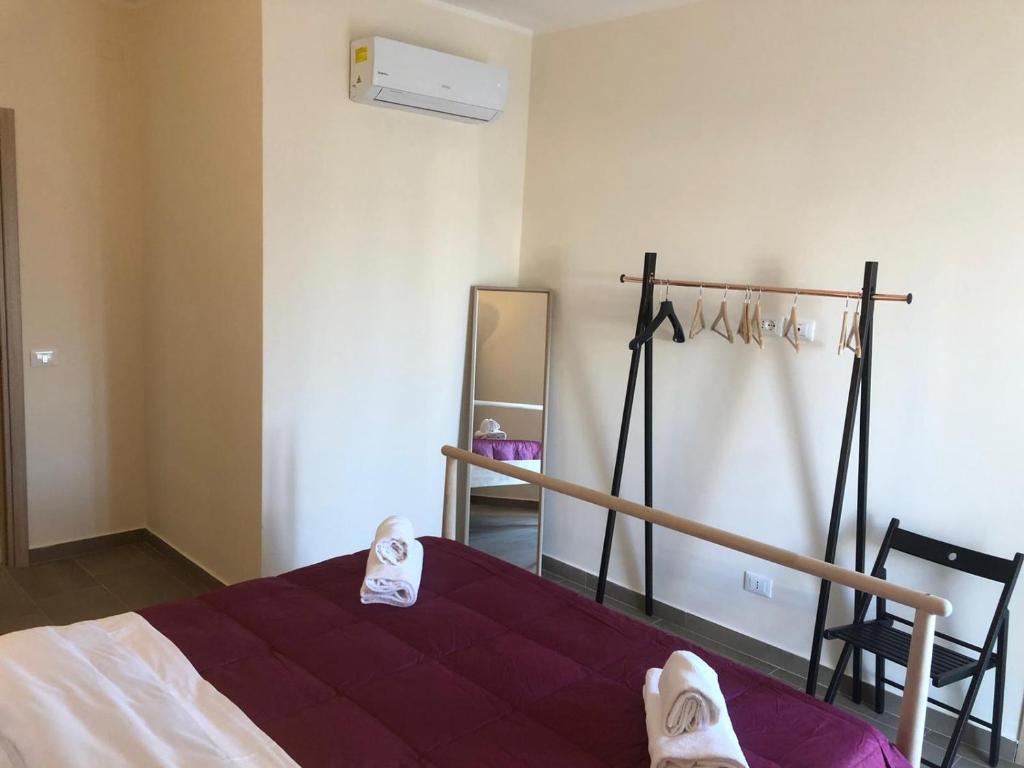 A bed or beds in a room at Lettera Living Penthouse