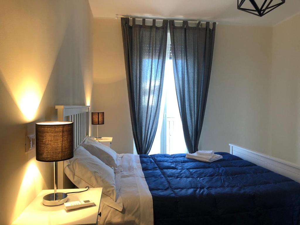 A bed or beds in a room at Lettera Living Penthouse