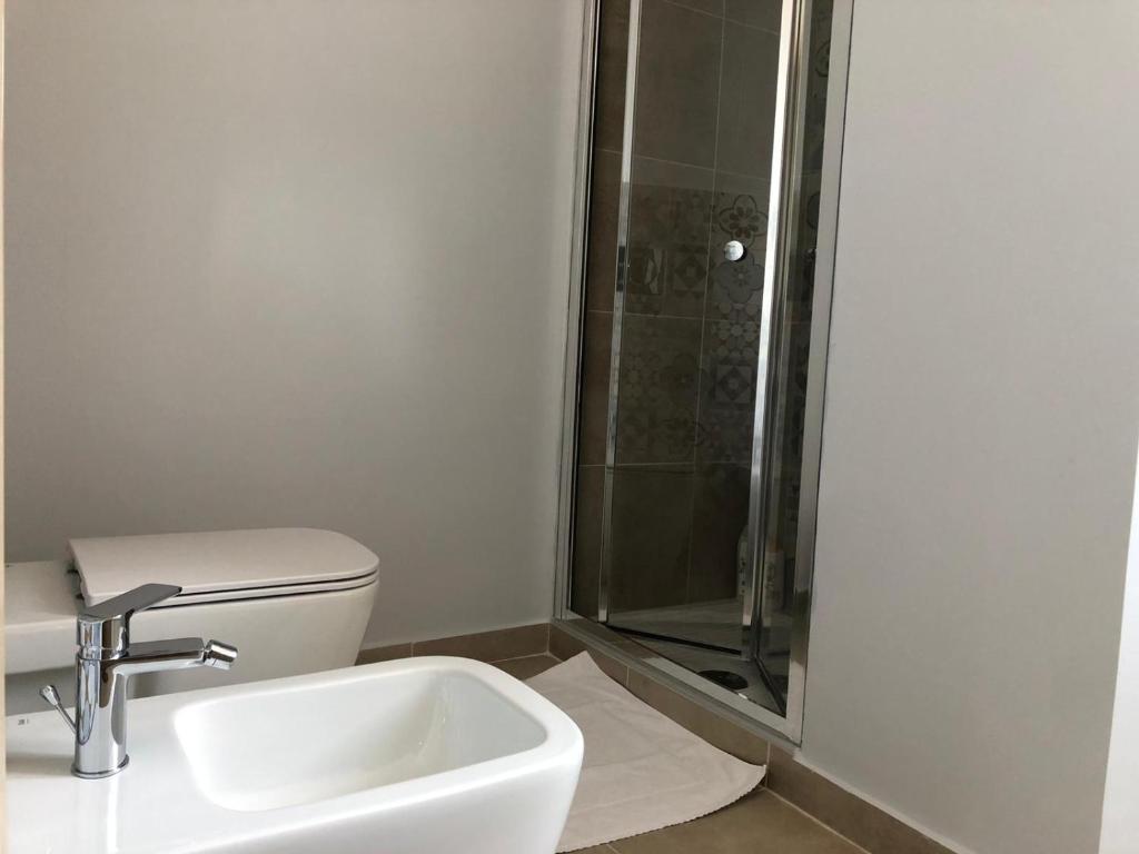 A bathroom at Lettera Living Penthouse