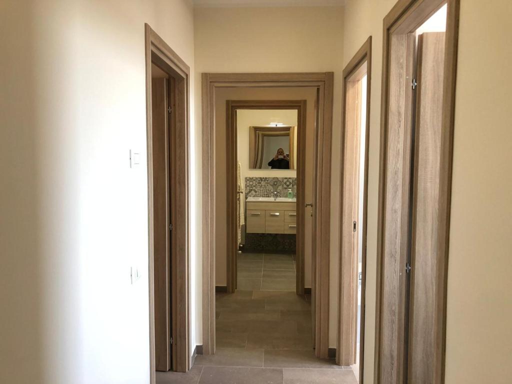 A bed or beds in a room at Lettera Living Penthouse