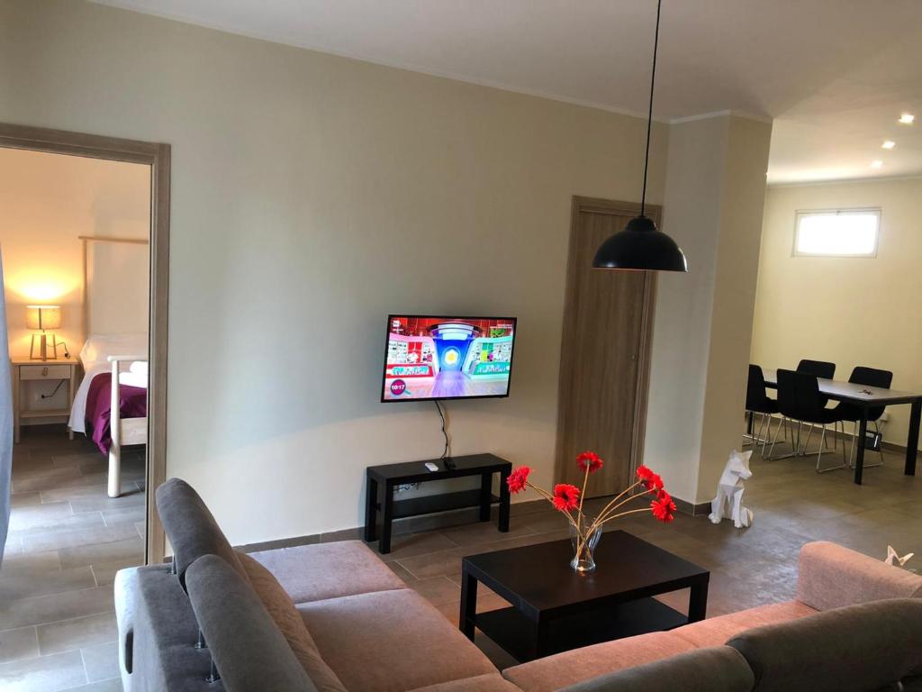 A television and/or entertainment centre at Lettera Living Penthouse