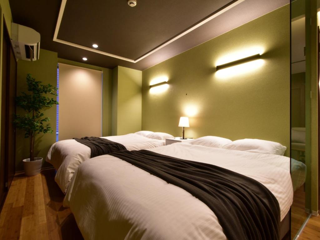 Postel nebo postele na pokoji v ubytování Corridor Knoll / Vacation STAY 75084