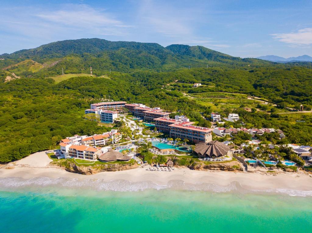 an aerial view of a resort on the beach at Armony Marival Resort & Spa Punta de Mita - MGallery collection in Punta Mita