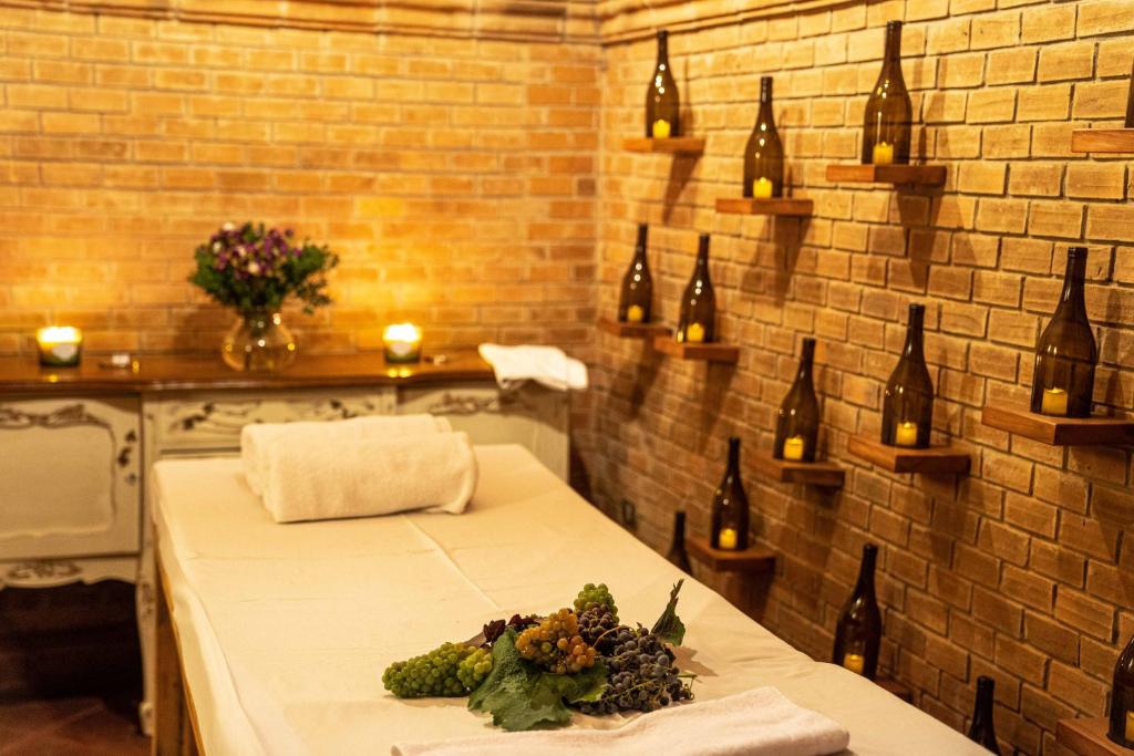 Uma cama ou camas num quarto em Viña La Playa Hotel & Winery