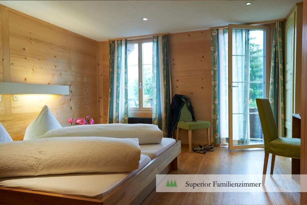 Postel nebo postele na pokoji v ubytování Hotel Waldrand