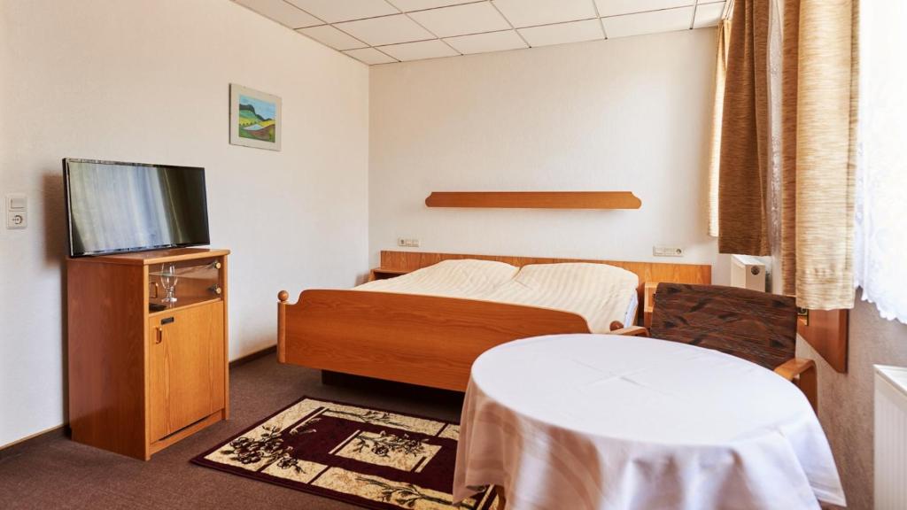 Postel nebo postele na pokoji v ubytování Pension Grenzhof