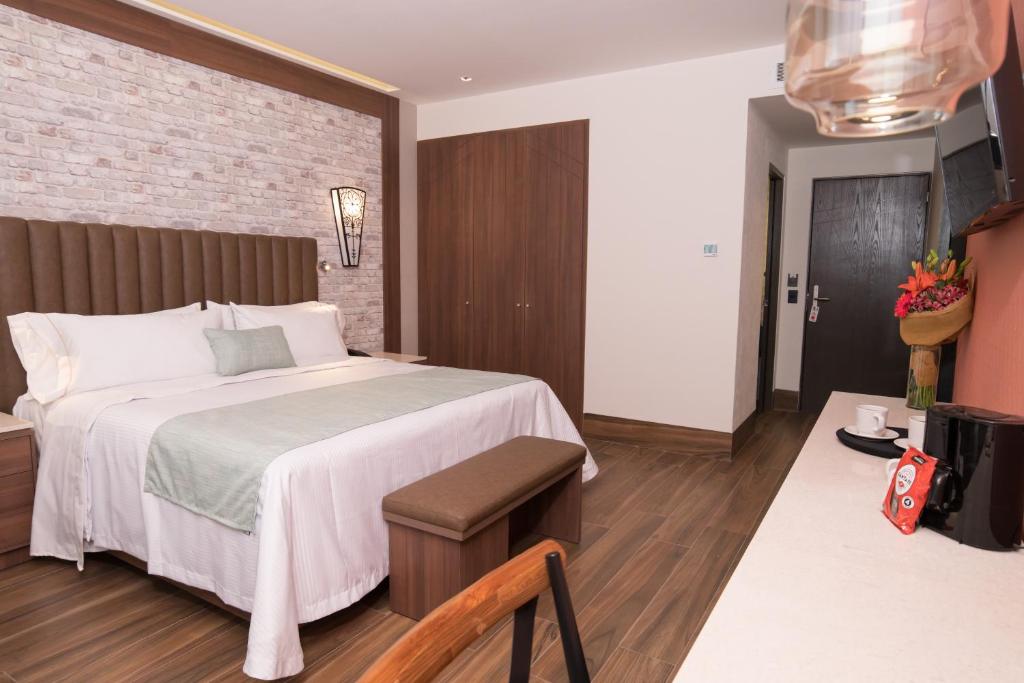 Postel nebo postele na pokoji v ubytování Hotel Ronda Minerva