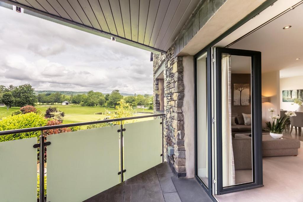 En balkon eller terrasse på The Penthouse @ Carus Green