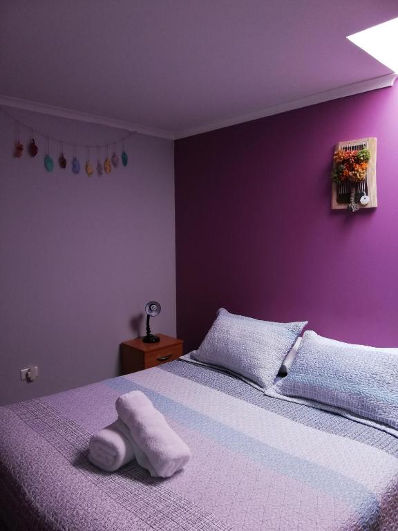 Postel nebo postele na pokoji v ubytování Hostal La Base