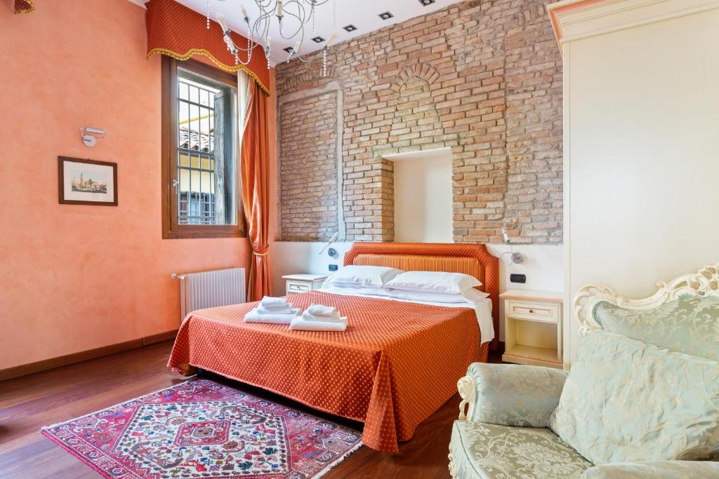 Postel nebo postele na pokoji v ubytování Venice Top Apartments and Rooms San Marco 2442-A