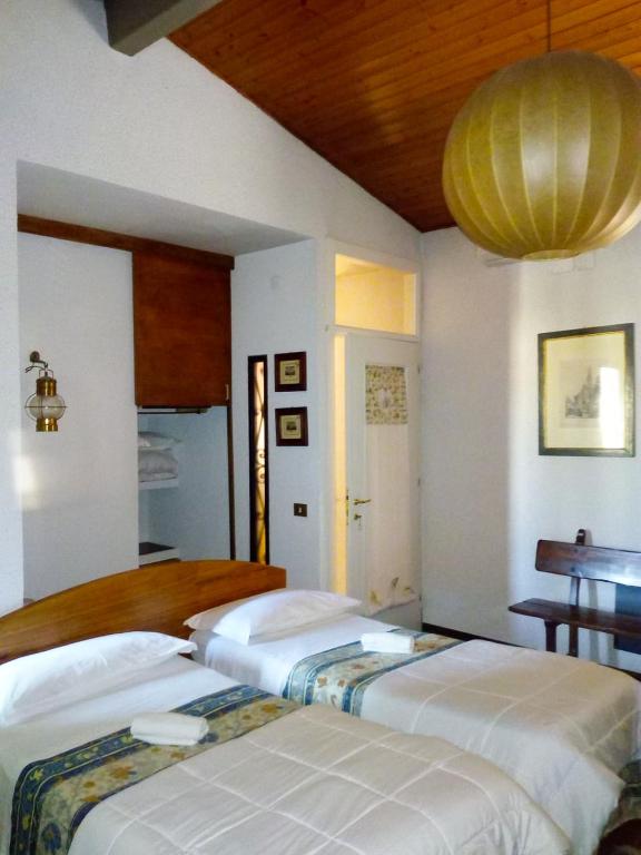 Postel nebo postele na pokoji v ubytování Bed and Breakfast Mimosa