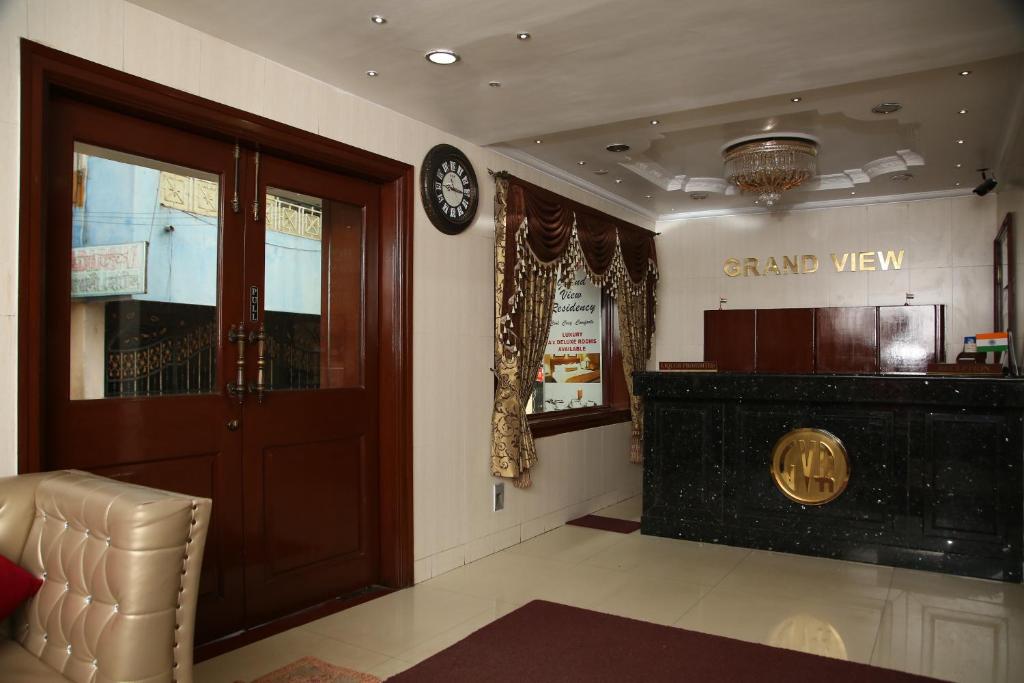 TV a/nebo společenská místnost v ubytování Grand View Residency Chennai