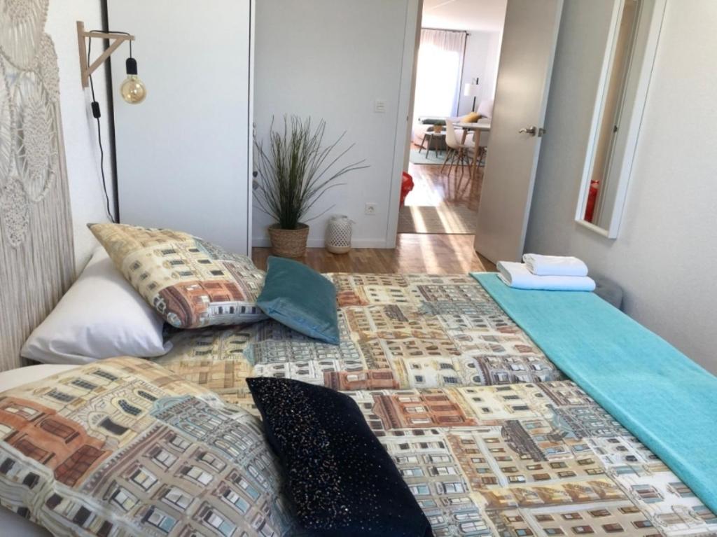 Postel nebo postele na pokoji v ubytování Apartamento Turístico El Enclave