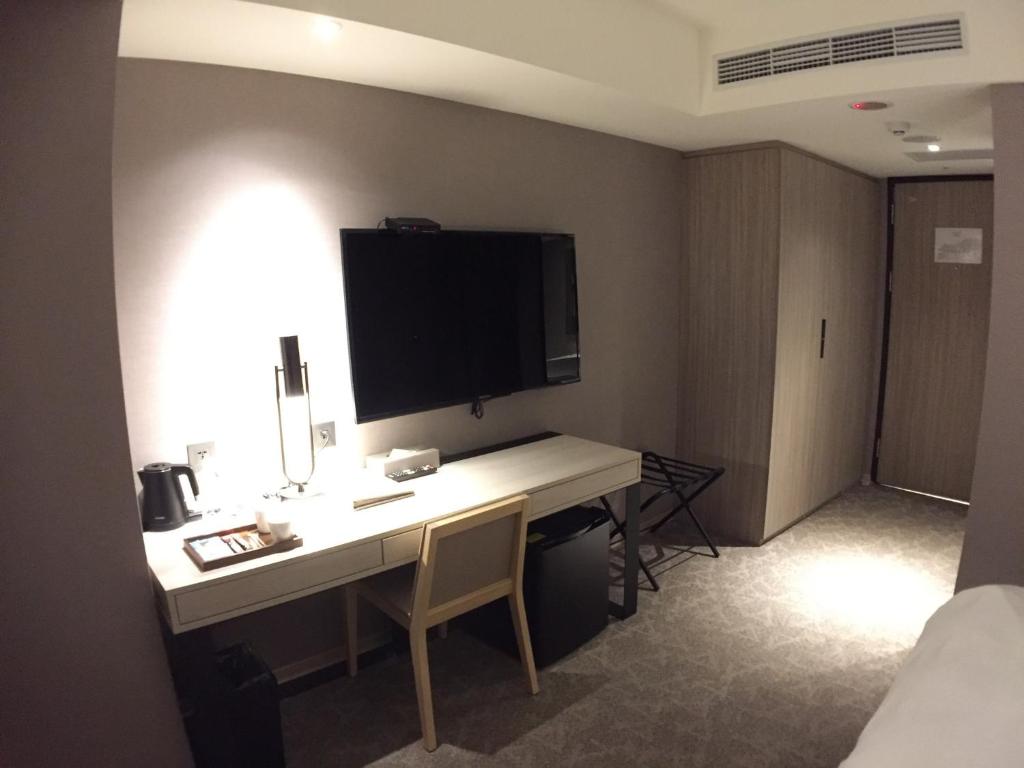 TV a/nebo společenská místnost v ubytování City Suites - Taoyuan Gateway