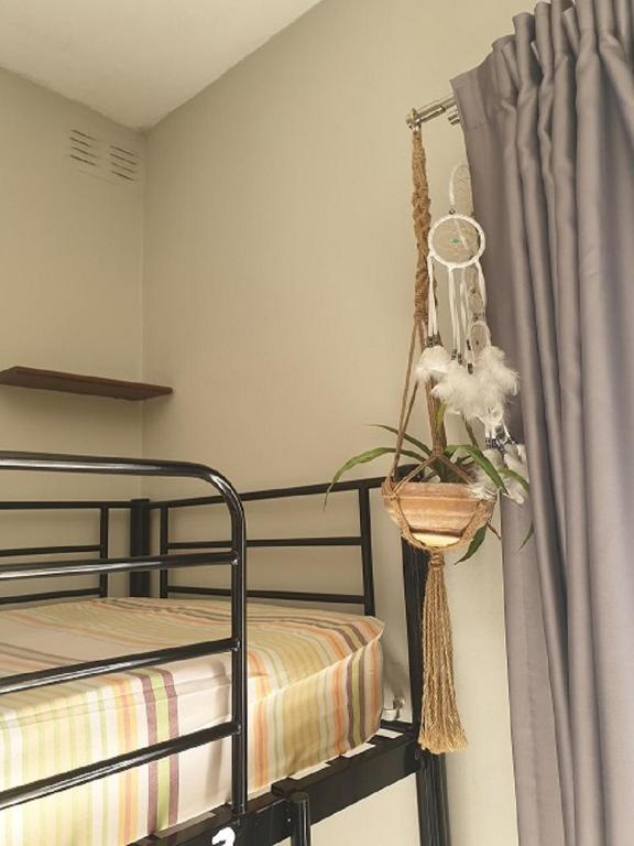 Postel nebo postele na pokoji v ubytování Boho Hostel