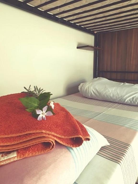 Postel nebo postele na pokoji v ubytování Boho Hostel