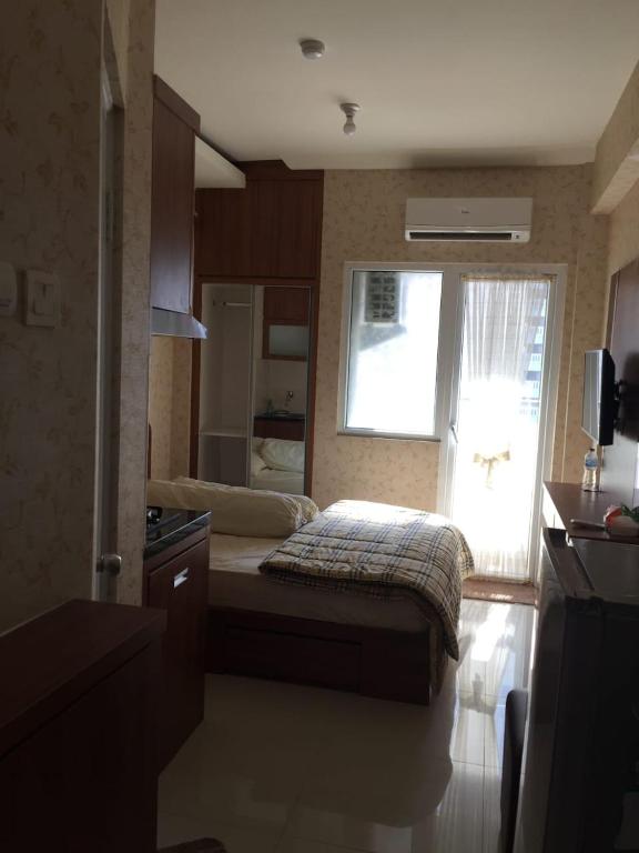 Green Pramuka City Studio Full Furnished by Vika 3