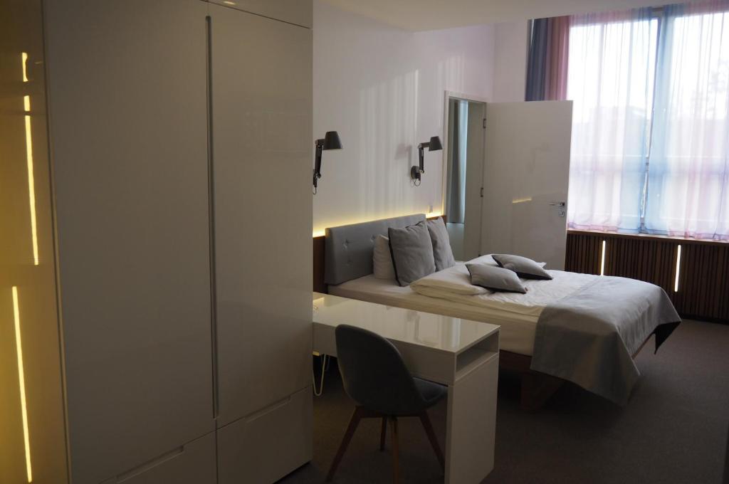 Postel nebo postele na pokoji v ubytování H24 Berlin Lichtenberg
